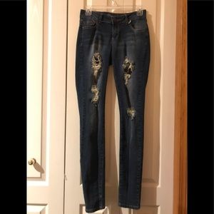 Skinny ripped blue jeans